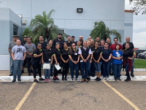 ECO Plastics employees pose for a photo during fire safety training at South Texas College's Regional Center for Public Safety Excellence.